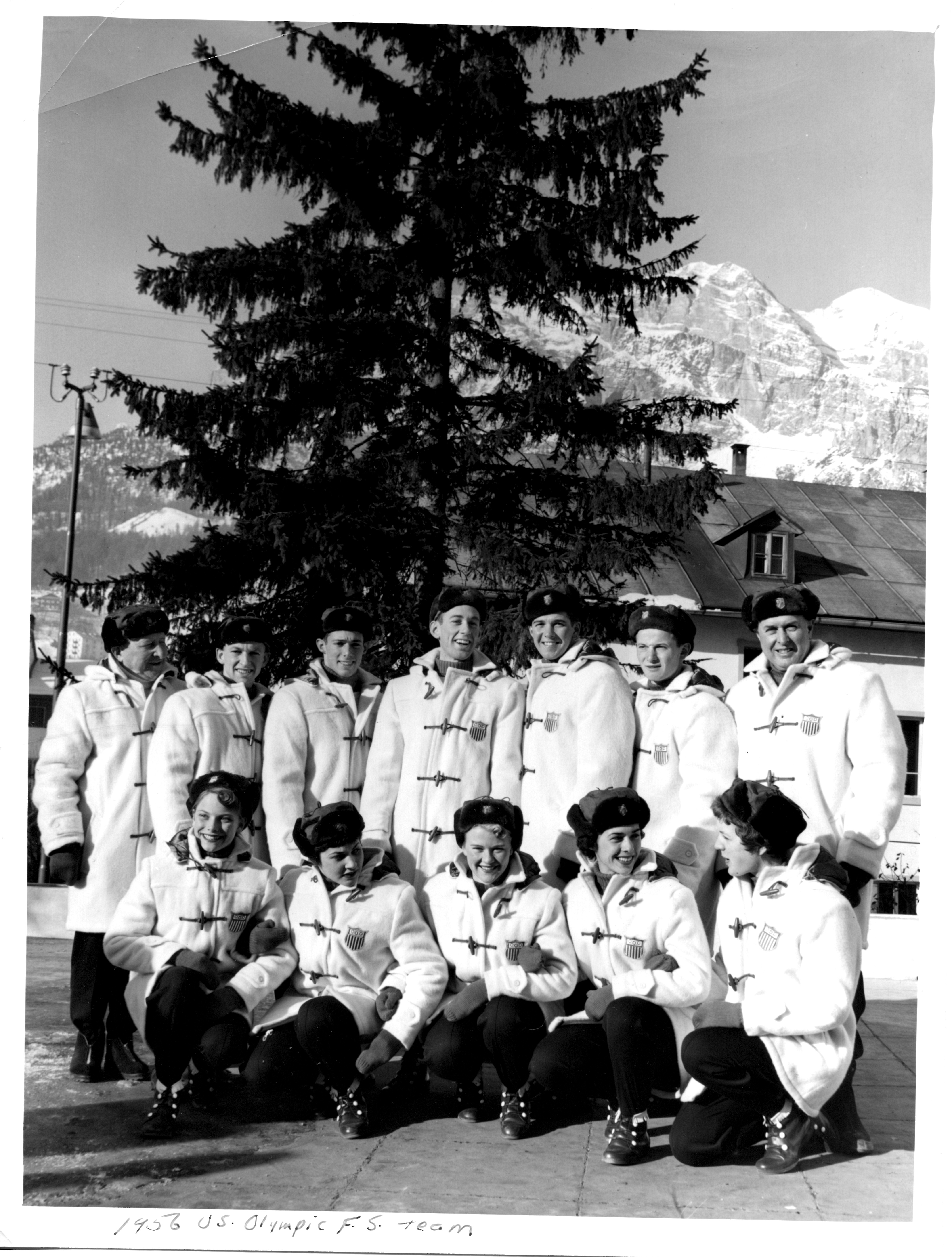 1956 U.S. Olympic Figure Skating Team poses for a group photo in the mountains