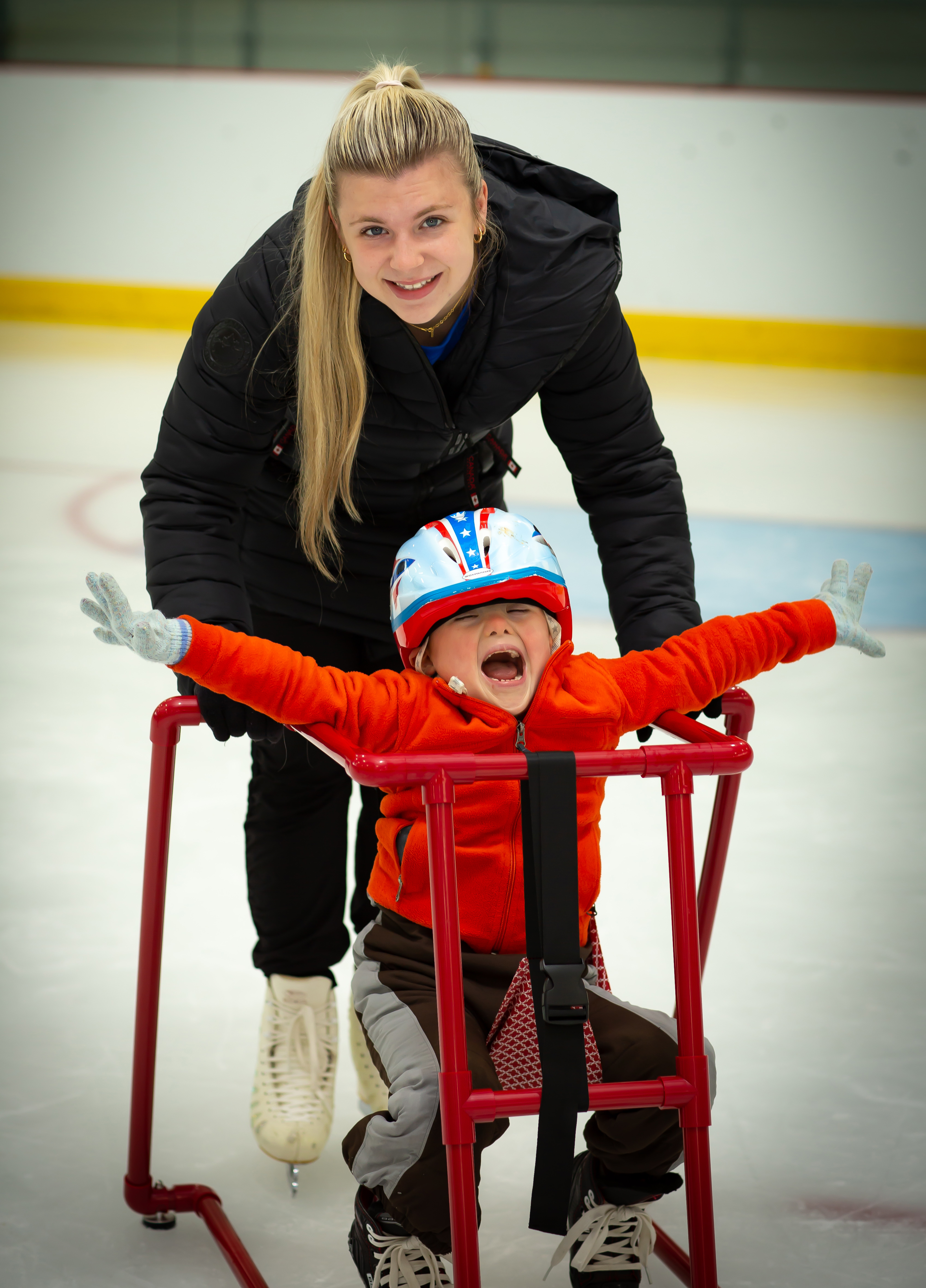 Junior Coach Allee Johnson with a very happy young skater