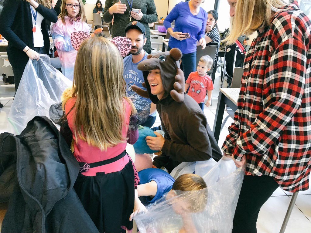 Jason Brown meets children at the Ronald McDonald House dressed as a moose