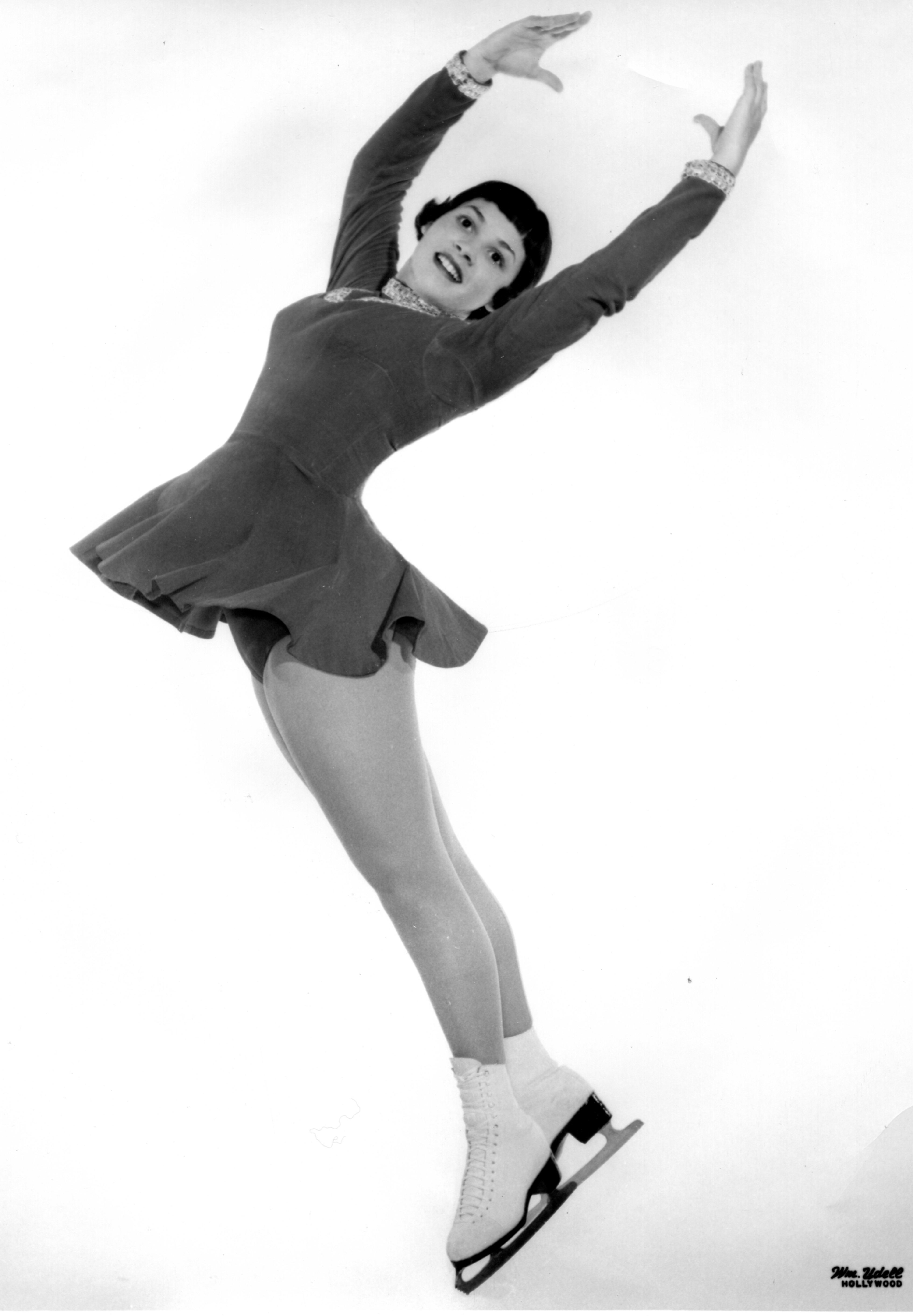 Catherine Machado performs in a black dress