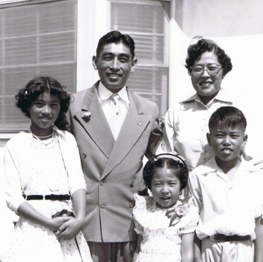 Black and white photo of the Doi family (l-r) Carole, George, Nancy, Gary and Kathleen are dressed up for Easter in 1956 at their home in Gardena, California. 