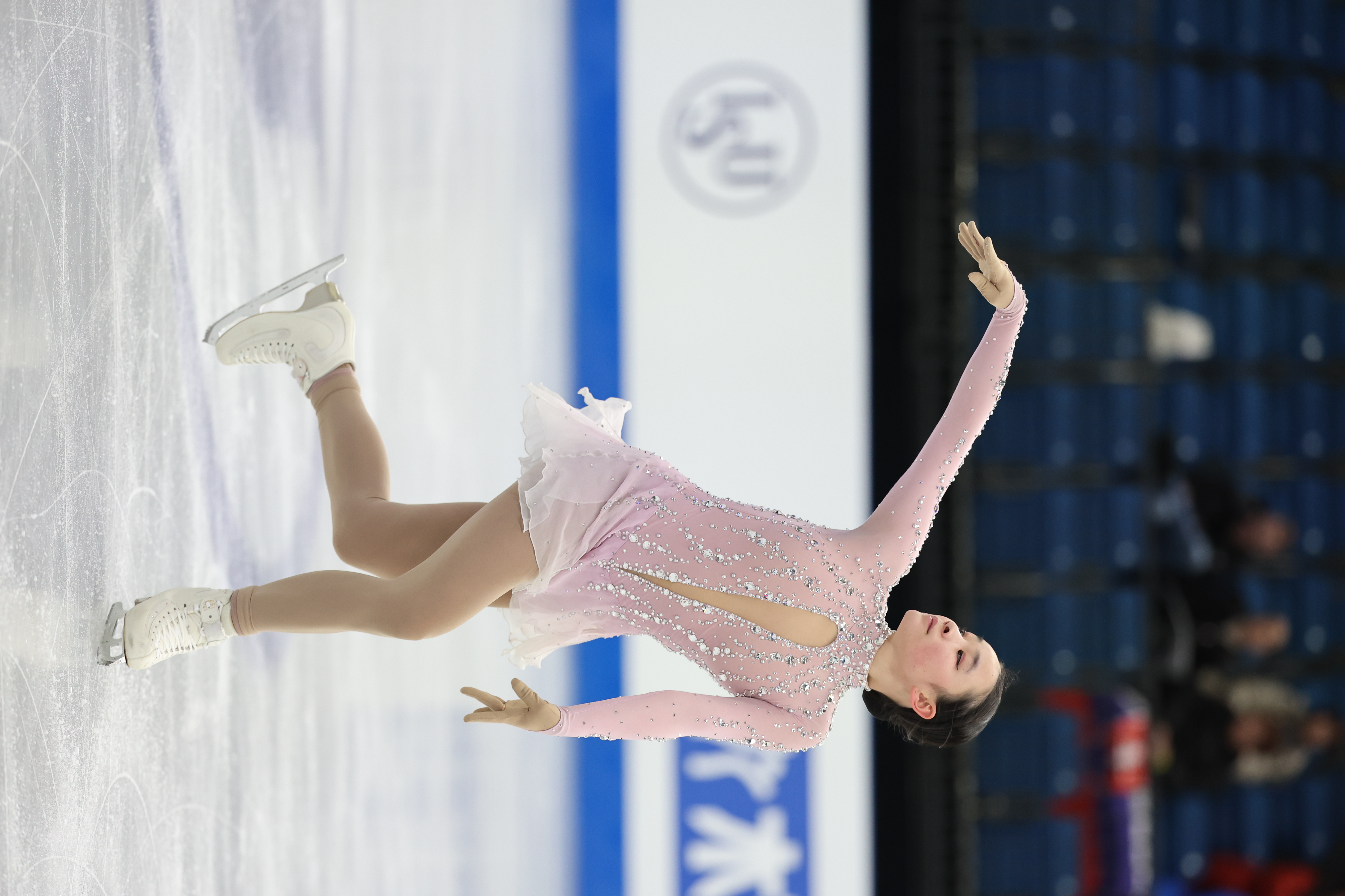 Elyce Lin-Gracey performs her short program at the World Junior Championships. 