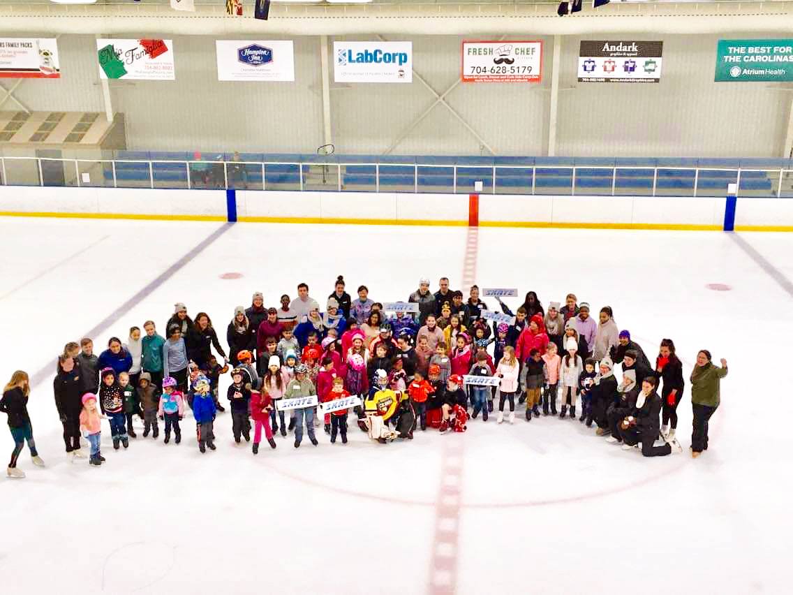 extreme ice center national skating month aerial group shot