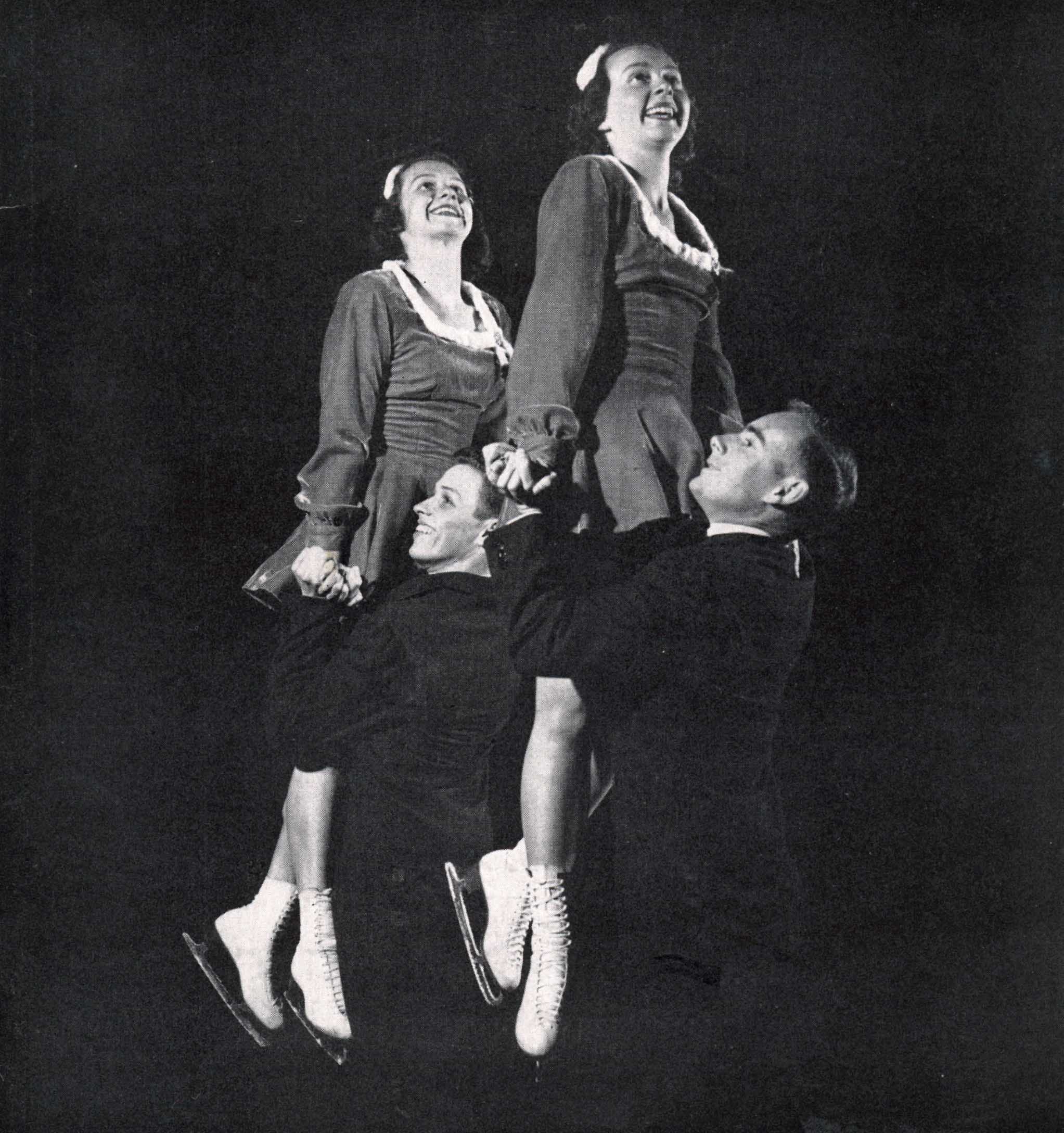 Gerhauser and Carpenter in an old photo posing together in skates and costumes.