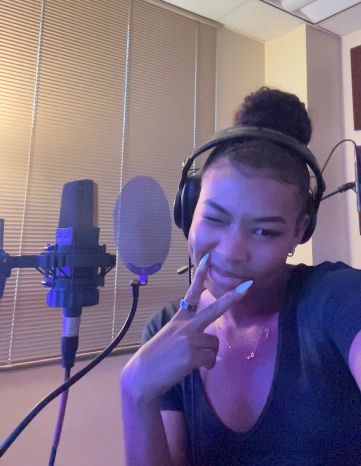 Starr Andrews has some fun in a recording studio.