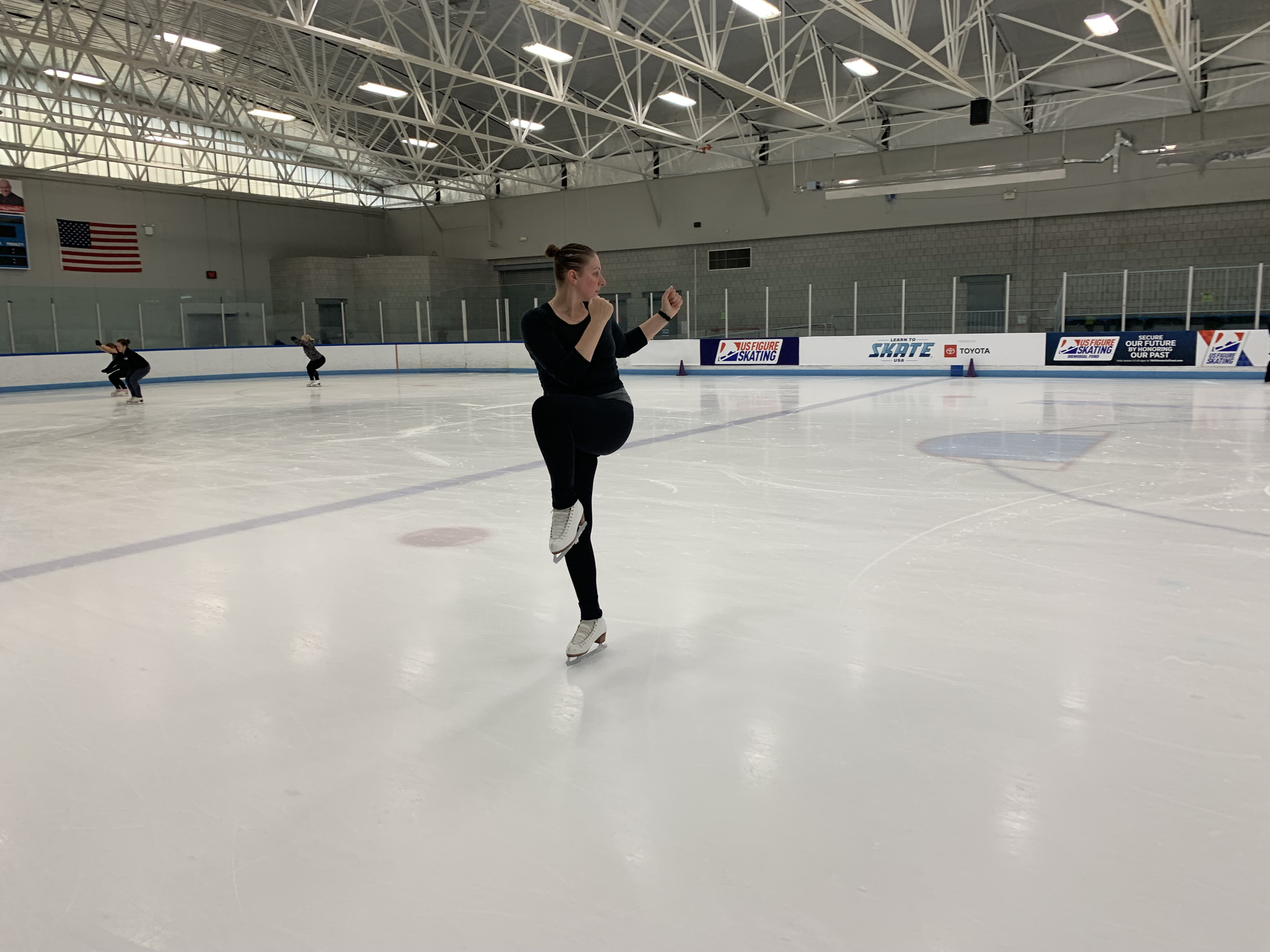 The second half of a drinking bird exercise performed on the ice.