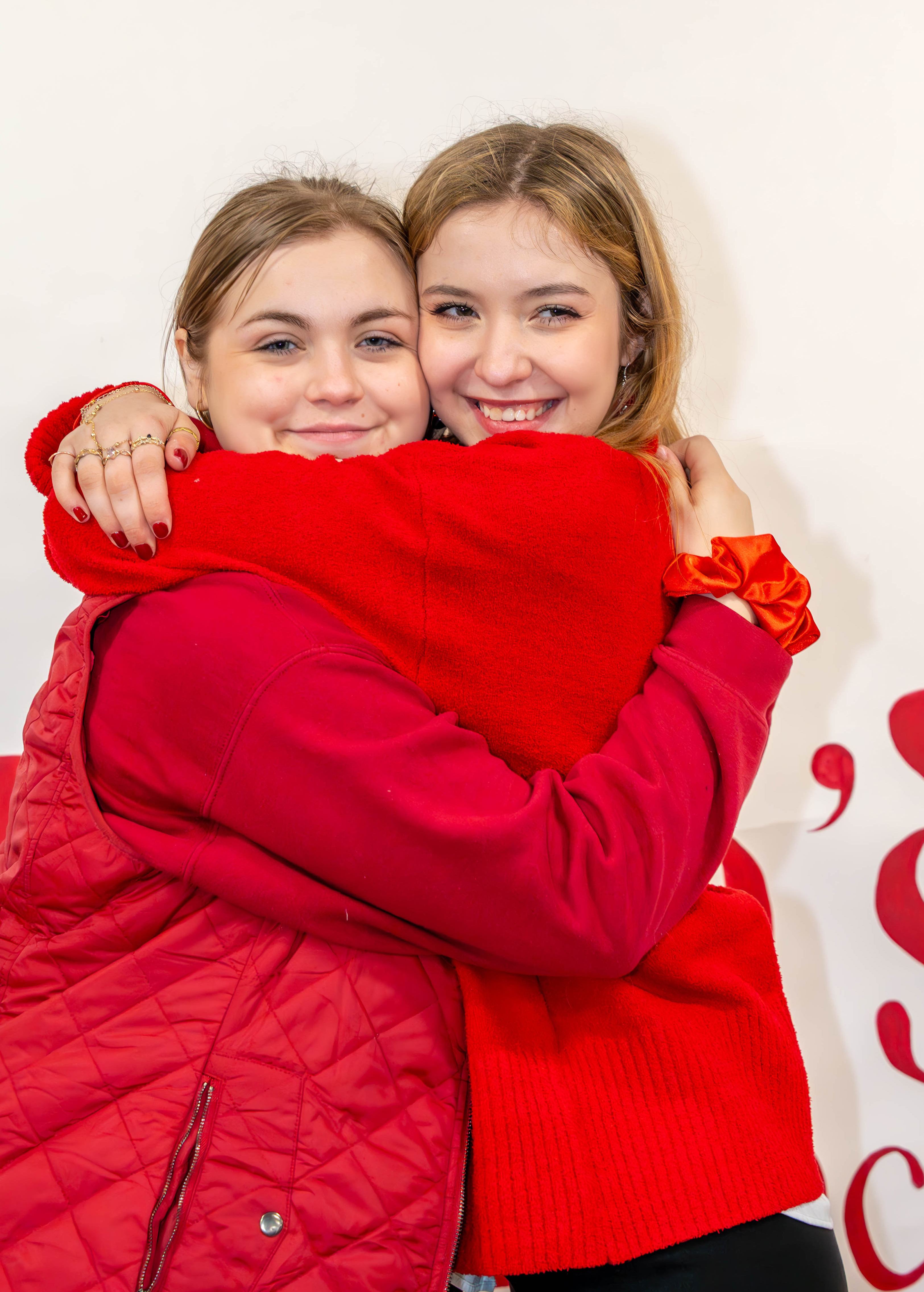 Isobel Carney embraces a close friend