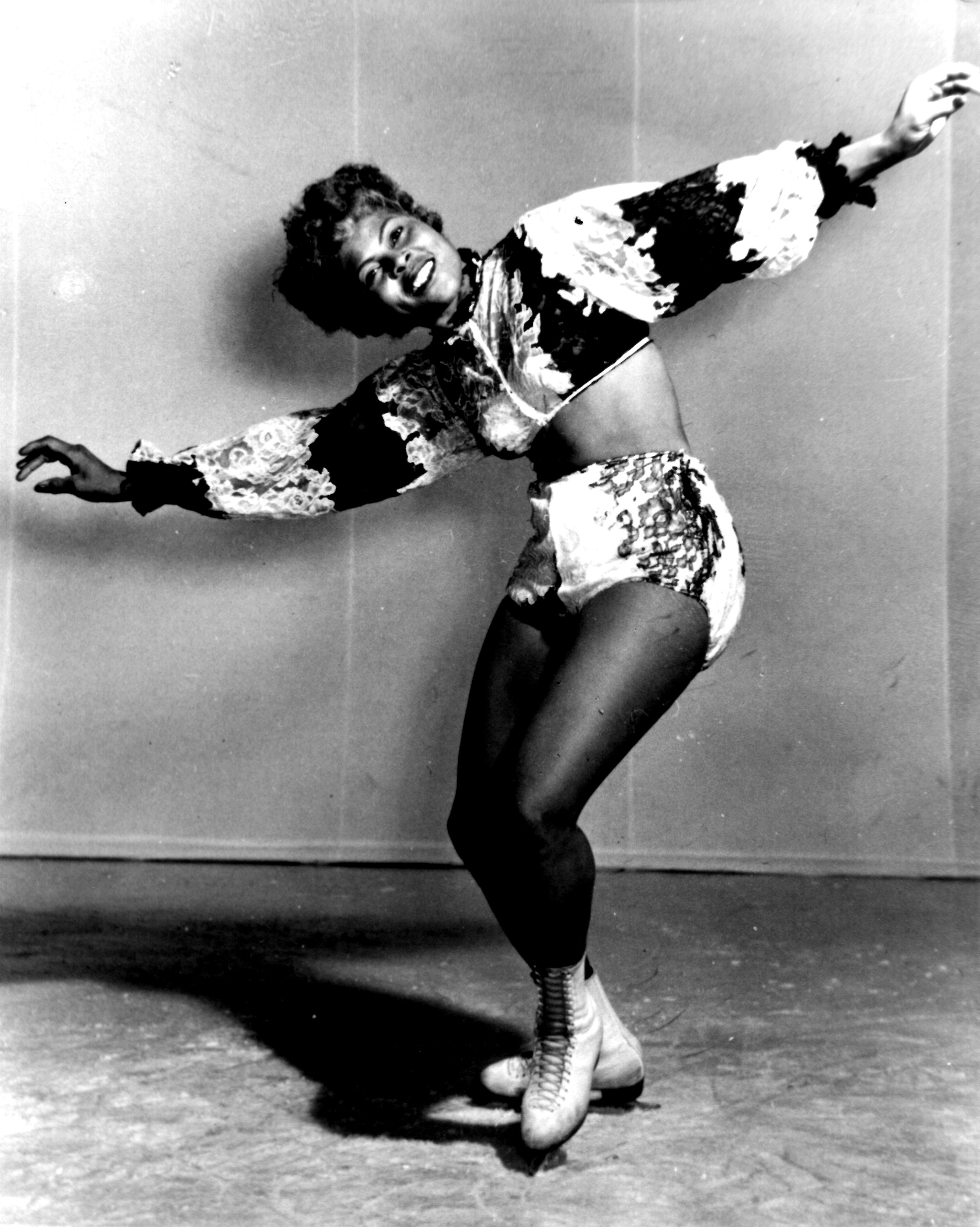 Mabel Fairbanks poses in a feathery show costume.