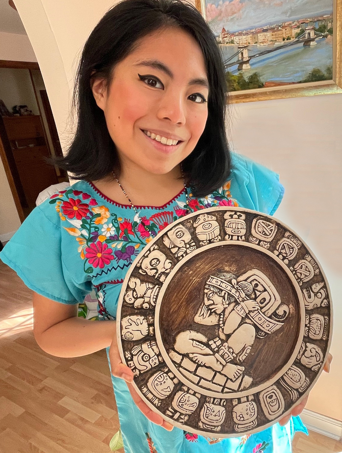 Michela Melillo holds up a piece of her Mayan heritage.