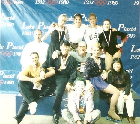 A group of adult skaters on the podium in 1996.