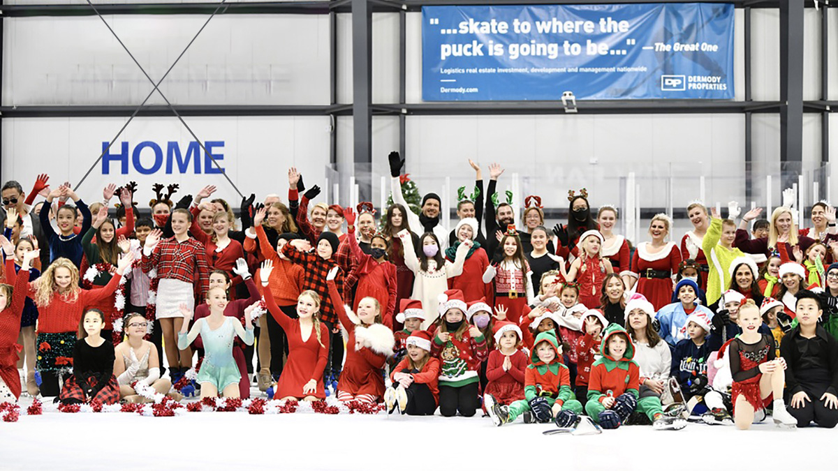 Dressed in holiday red, members of Reno Ice participate in the rink's annual holiday show.