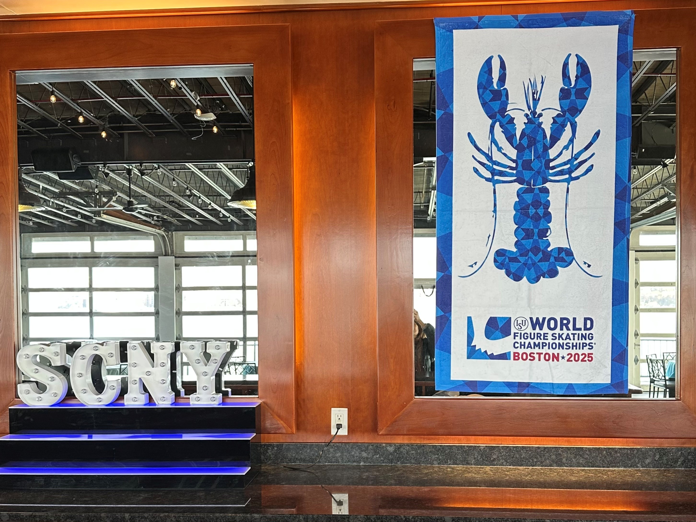 The Skating Club of New York put up posters promoting the upcoming World Championships in Boston at the Chelsea Piers venue.