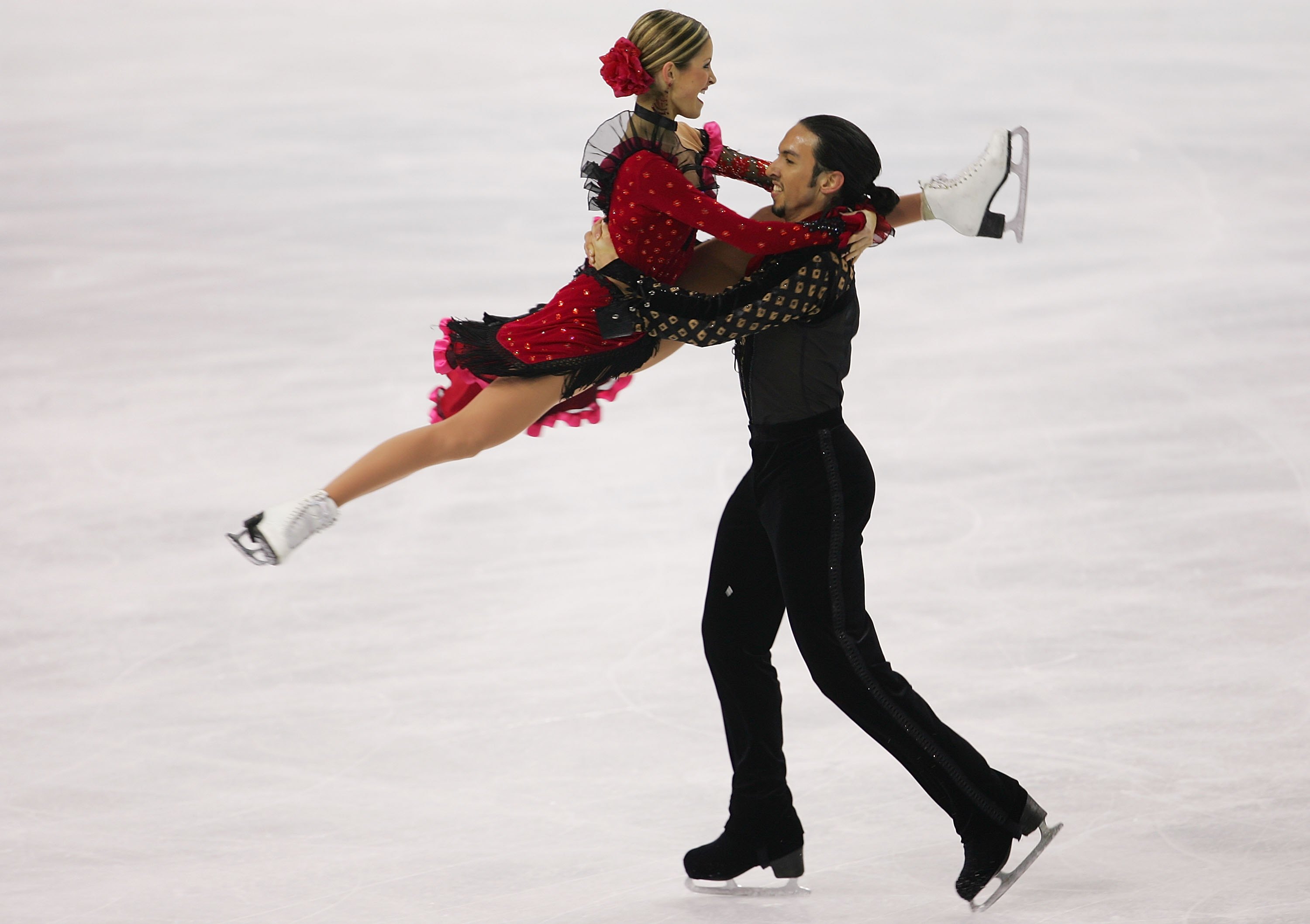 Tanith Belbin and Ben Agosto perform a lift in their tango-inspired free dance at the 2006 Olympics.