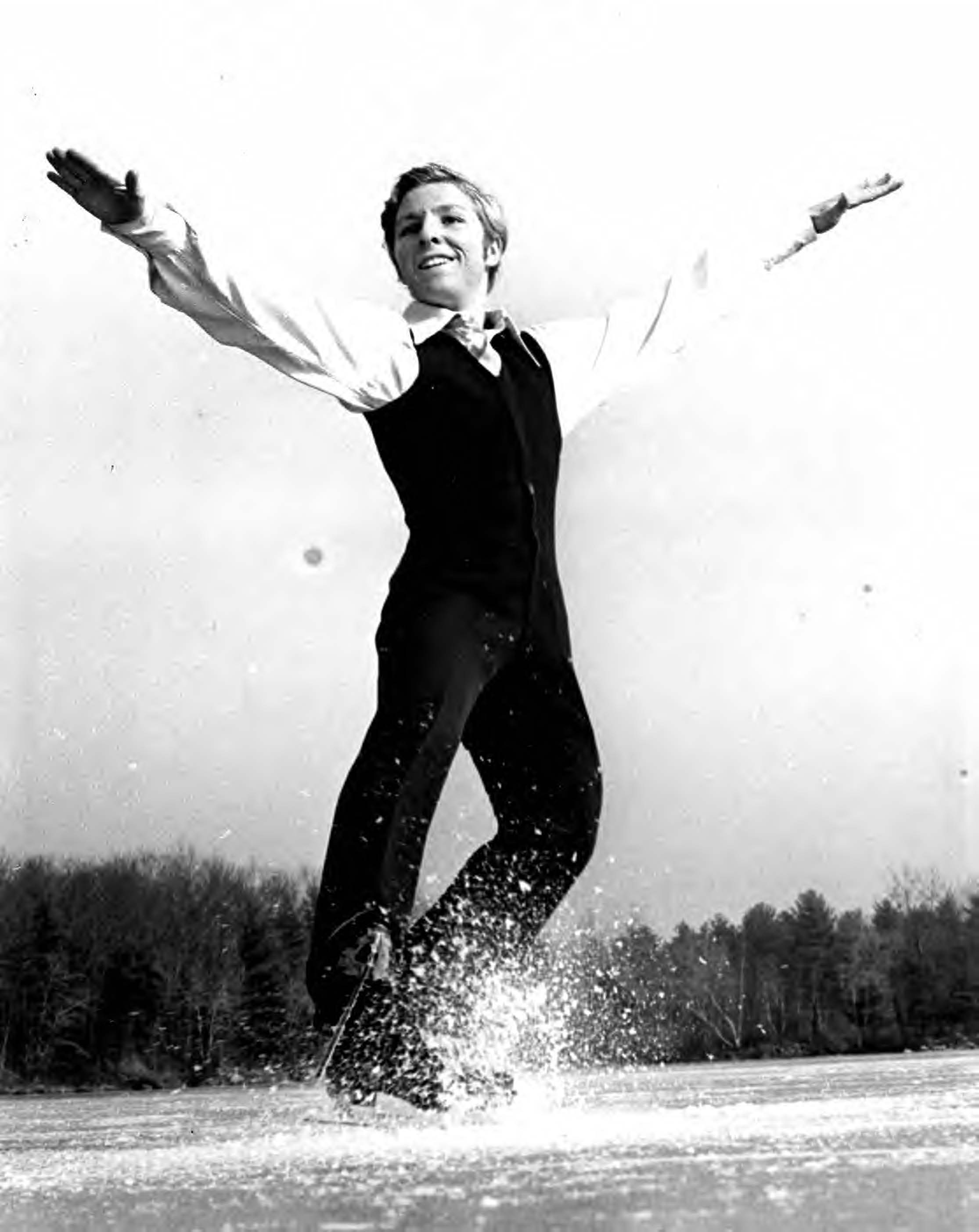 Roger Turner gleefully skates on a frozen pond.