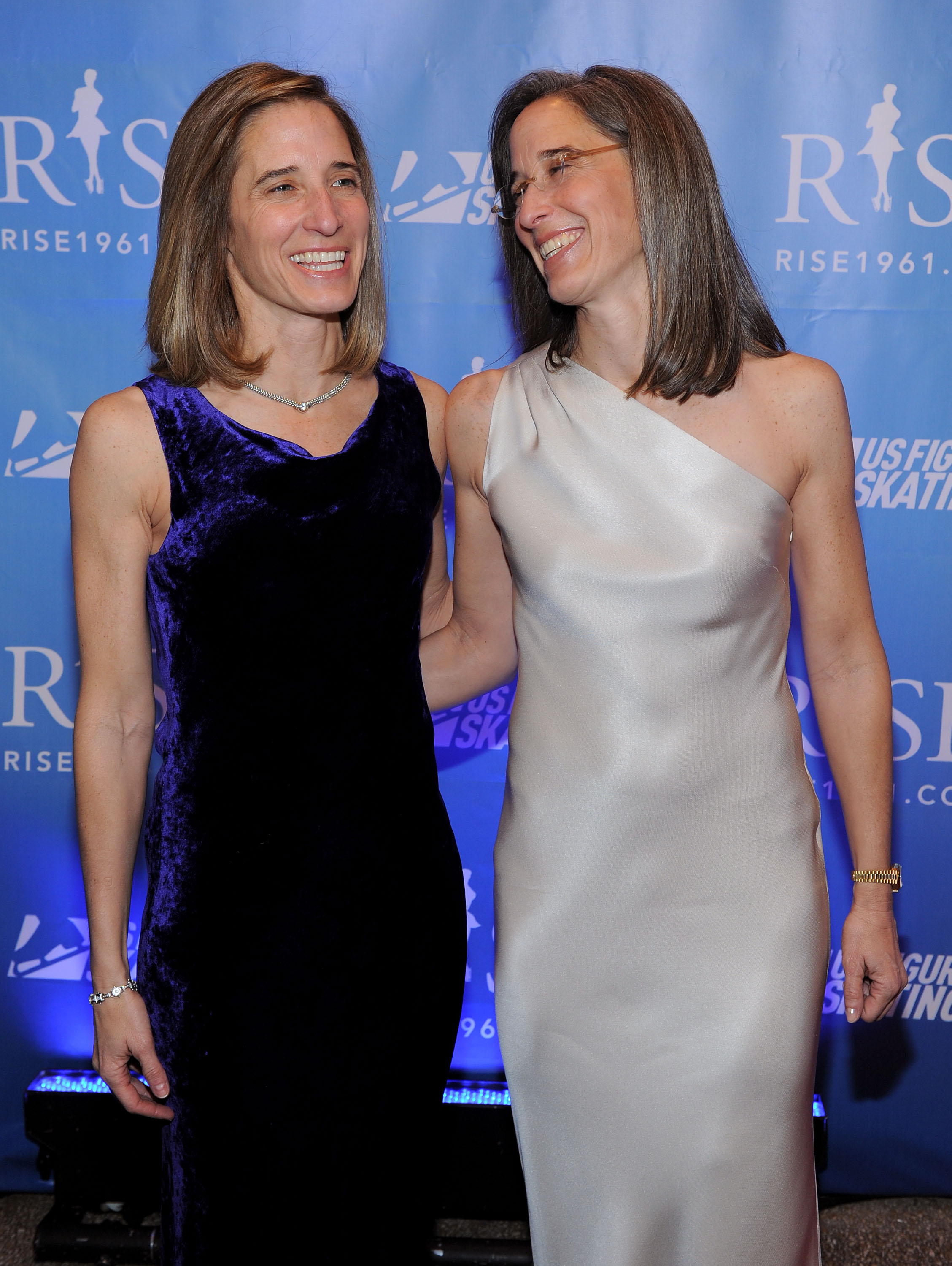 Twin sisters Lisa and Nancy Stern Winters pose on the red carpet at the RISE premier in New York City.