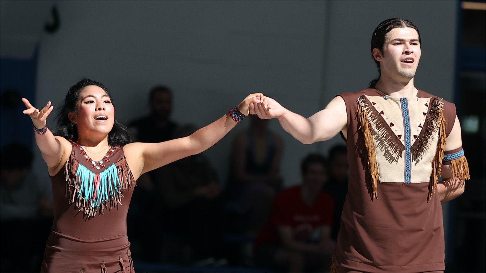 Wearing clothing of her Mayan heritage, Michela Melillo and ice dance partner Karl Schapfel perform a powerful free skate.