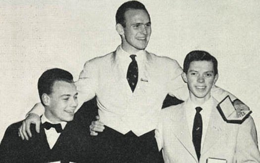 Dick Button is held up by fellow competitors after winning gold at the 1952 Olympic Games.