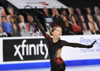 Mia Kalin skates in a red and black leotard at the 2021 U.S. Championships.