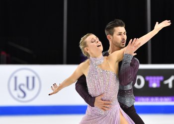 Madison Hubbell and Zachary Donohue skate in purple at 2021 Skate America.