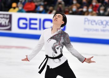Vincent Zhou in his Crouching Tiger Hidden Dragon costume looking to the sky during his free skate at the 2022 Toyota U.S. Figure Skating Championships.