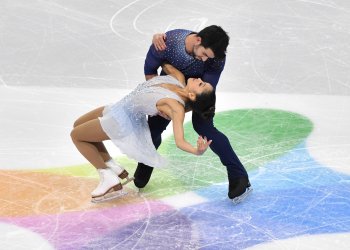 Brian Johnson holds JEssica Calalang, who is leaning back, in their closing pose at the 2020 Four Continents Championships.