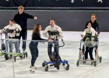 Skters using various mobility devices skate in the annual ice show 