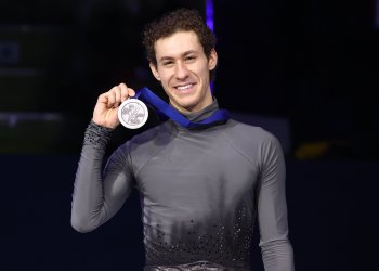 Jason Brown poses with his silver medal at the 2020 Four Continents Championships
