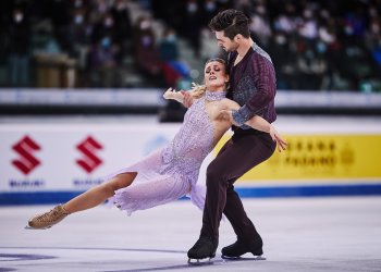 Zachary Donohue holds Madison Hubbell in a short lift.