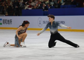 On their knees, Elliana and Ethan Peal face each other in their 'Pearl Harbor' free dance.