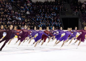 Dressed in purple and red, the Haydenettes showcase their speed and unison in their line element