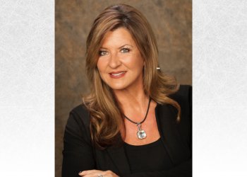 headshot of Steffany Hanlen. She is an older woman with long brown hair wearing a black shirt with a black blazer over top and a crystal necklace
