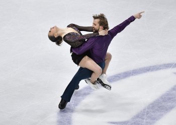 Kaitlin Hawayek and Jean Luc Baker perform at lift at the 2021 World Championships