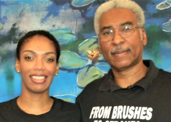 Joy and Jerald pose for a photo smiling.