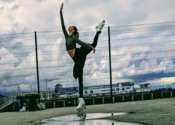 Kori Schagunn performs a spiral in roller skates