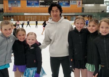 Nathan Chen poses with six young girls during the reveal on "Secret Celebrity Renovation."
