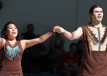 Wearing clothing of her Mayan heritage, Michela Melillo and ice dance partner Karl Schapfel perform a powerful free skate.