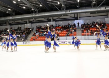 Team Image skates in blue dresses