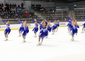 Team Image skates in blue dresses
