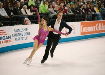 Madison Chock and Evan Bates perform at a competition.