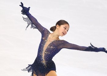 Alysa Liu poses during her free skate at a competition in 2019-20